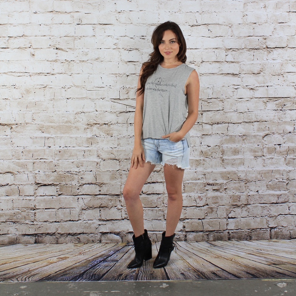Grey "I gave her shelter only to find she was the storm" Sleeveless T-Shirt